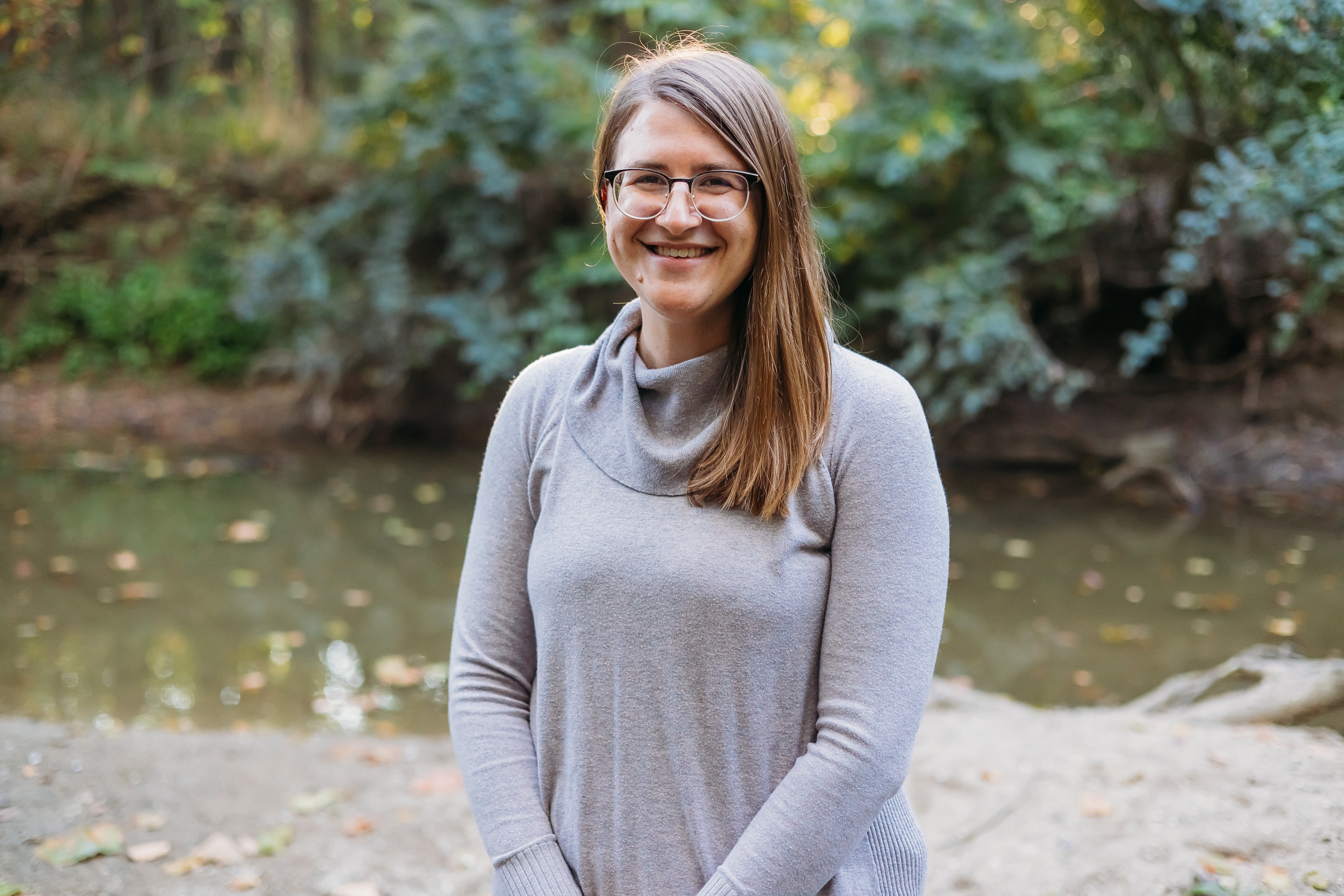 Image of Dr. Alyssa Hoffman with trees in background.